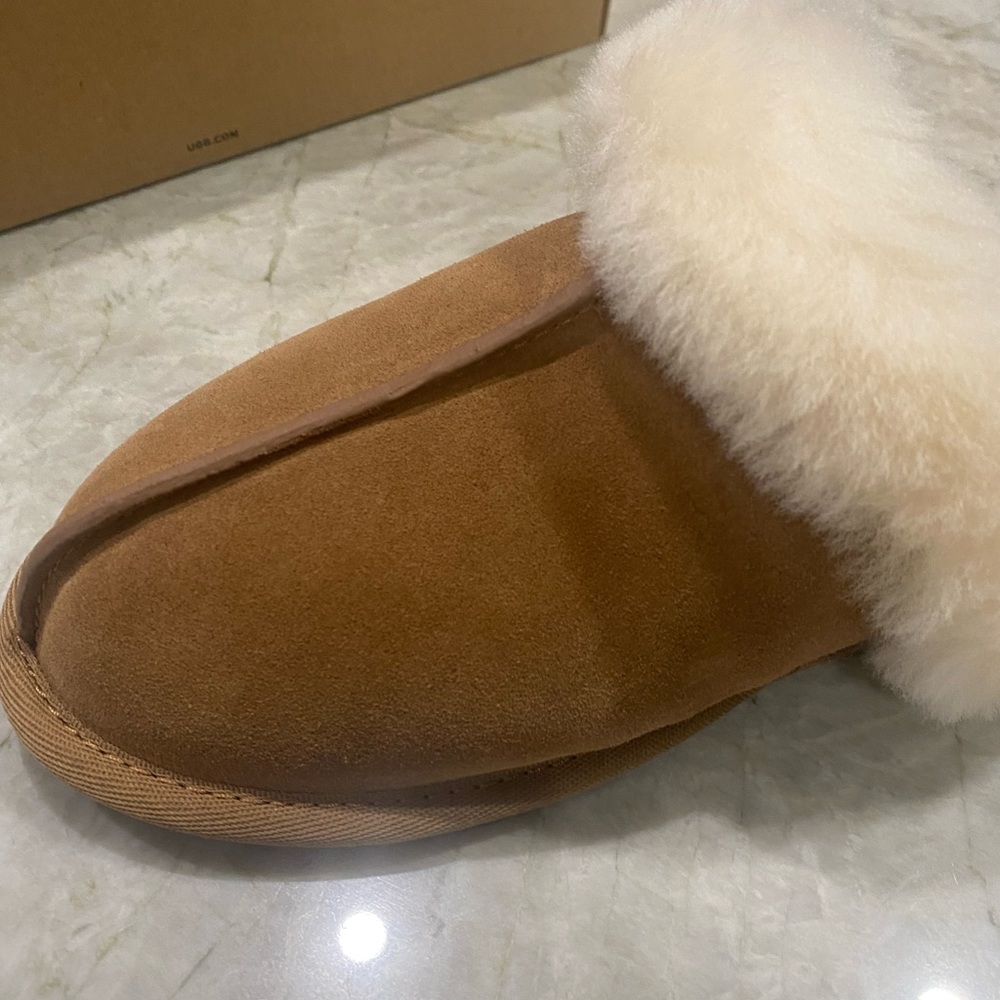 UGG Scuffette II size 7 women. Never worn, new in box. Traditional tan color.
